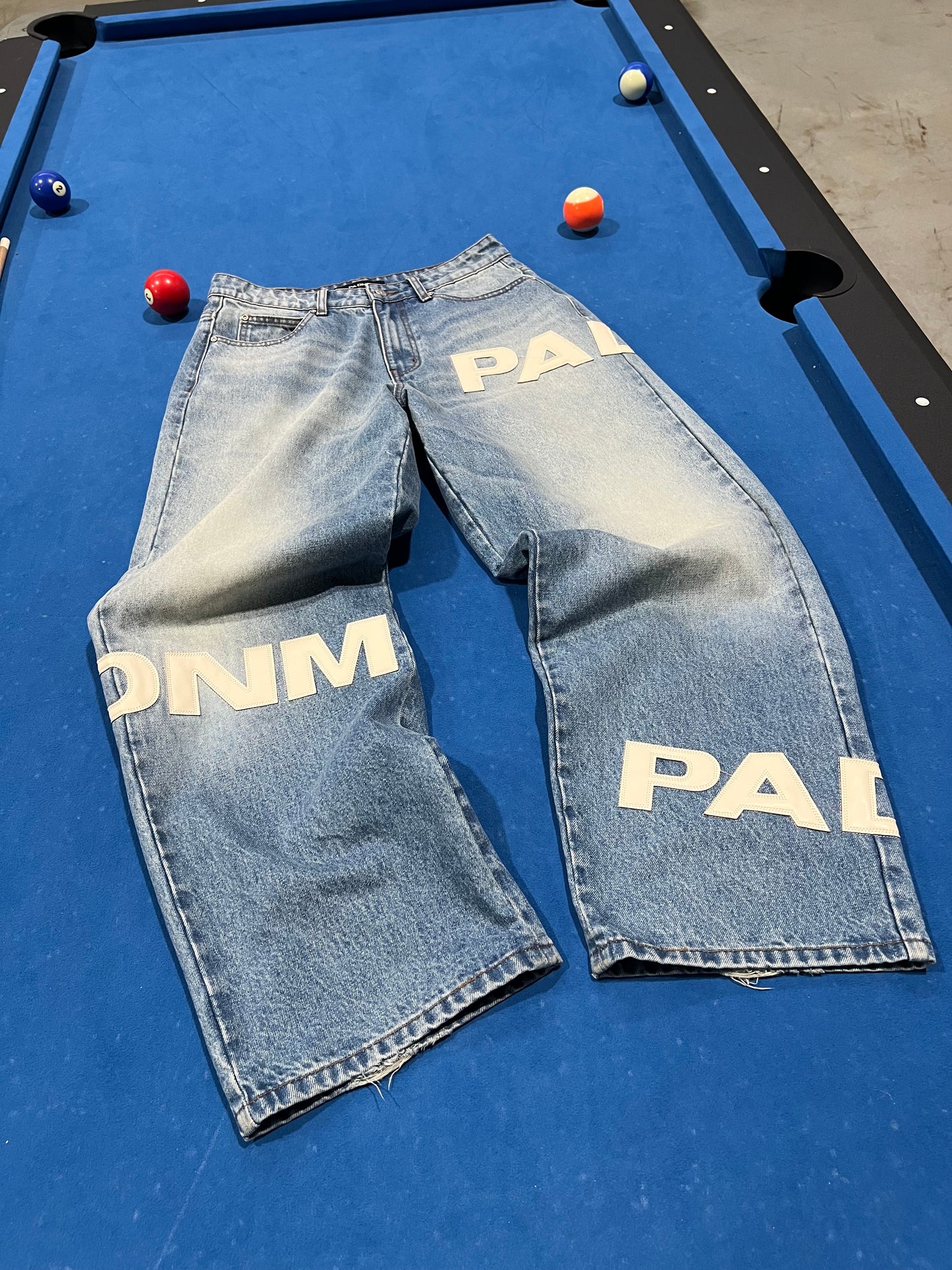 THE MONOGRAM DENIM PANTS